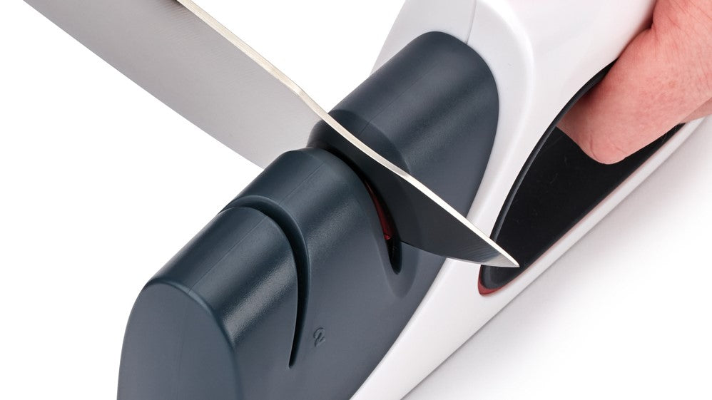 knife blade in a manual knife sharpener